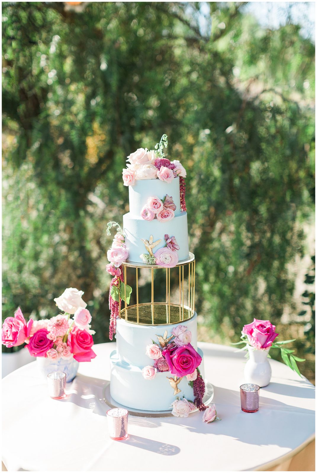 3 tier wedding cake with pink florals