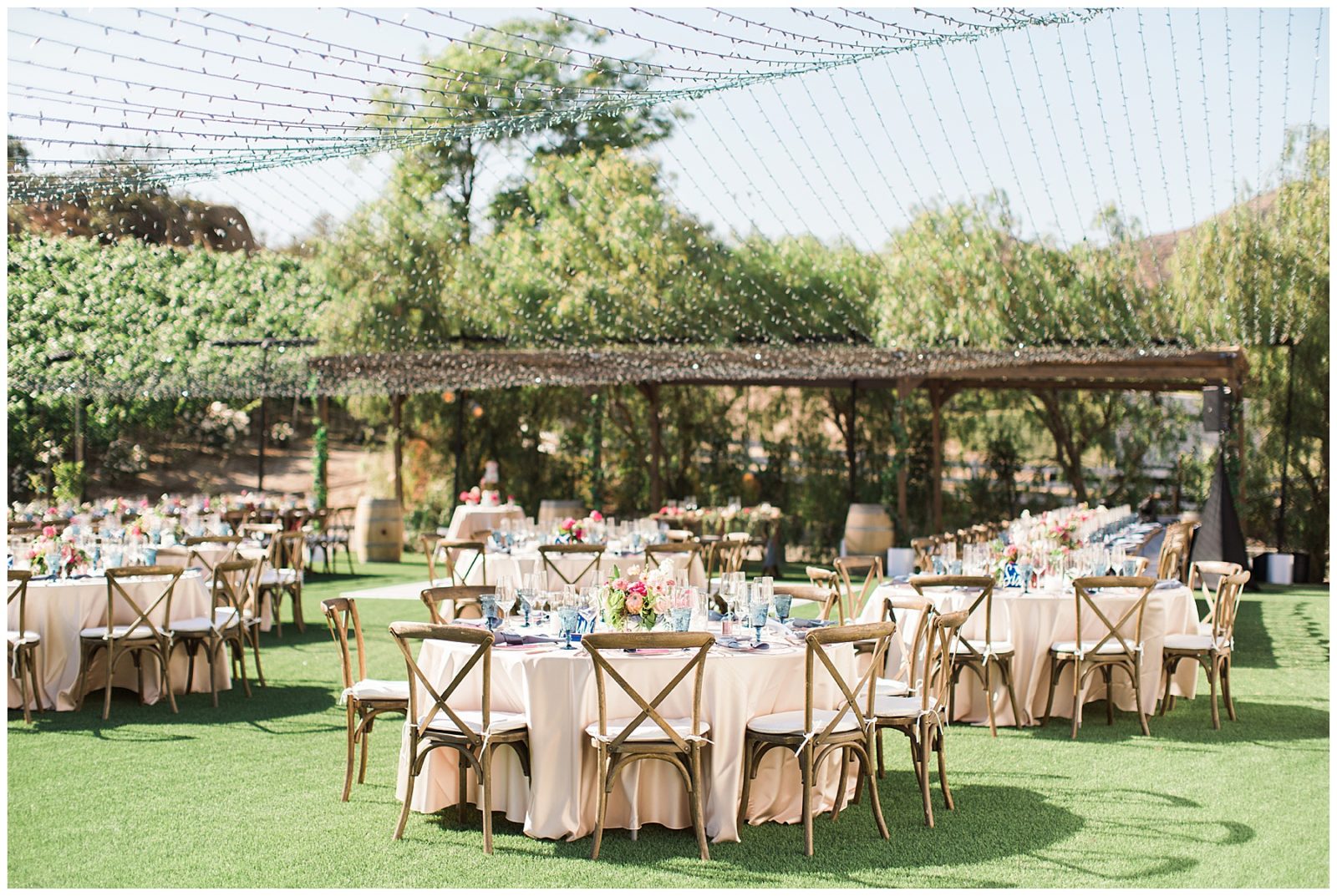 round tables at outdoor summer wedding reception