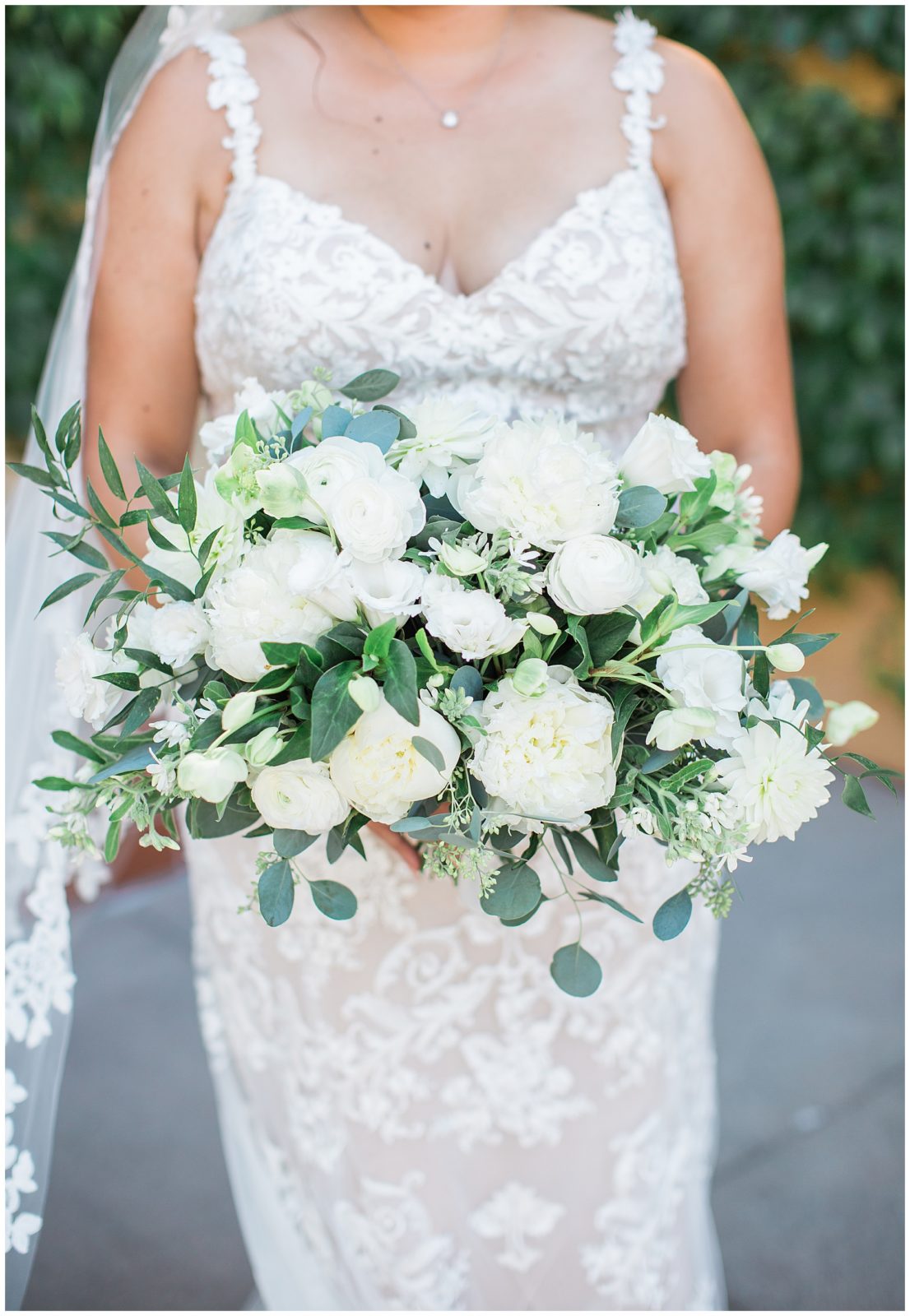 bridal bouquet with white flowers and greenery