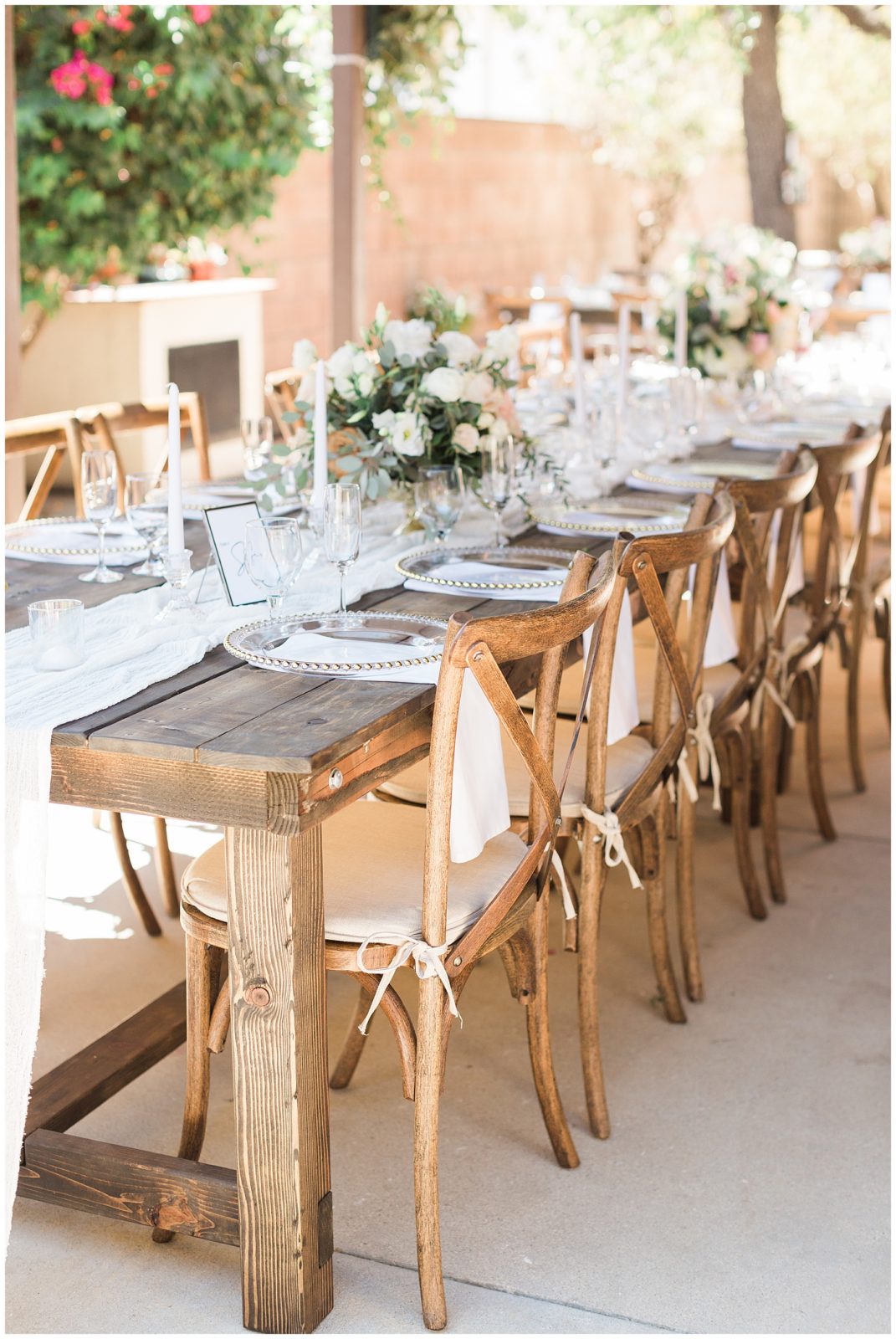 long farmhouse tables for romantic outdoor wedding reception