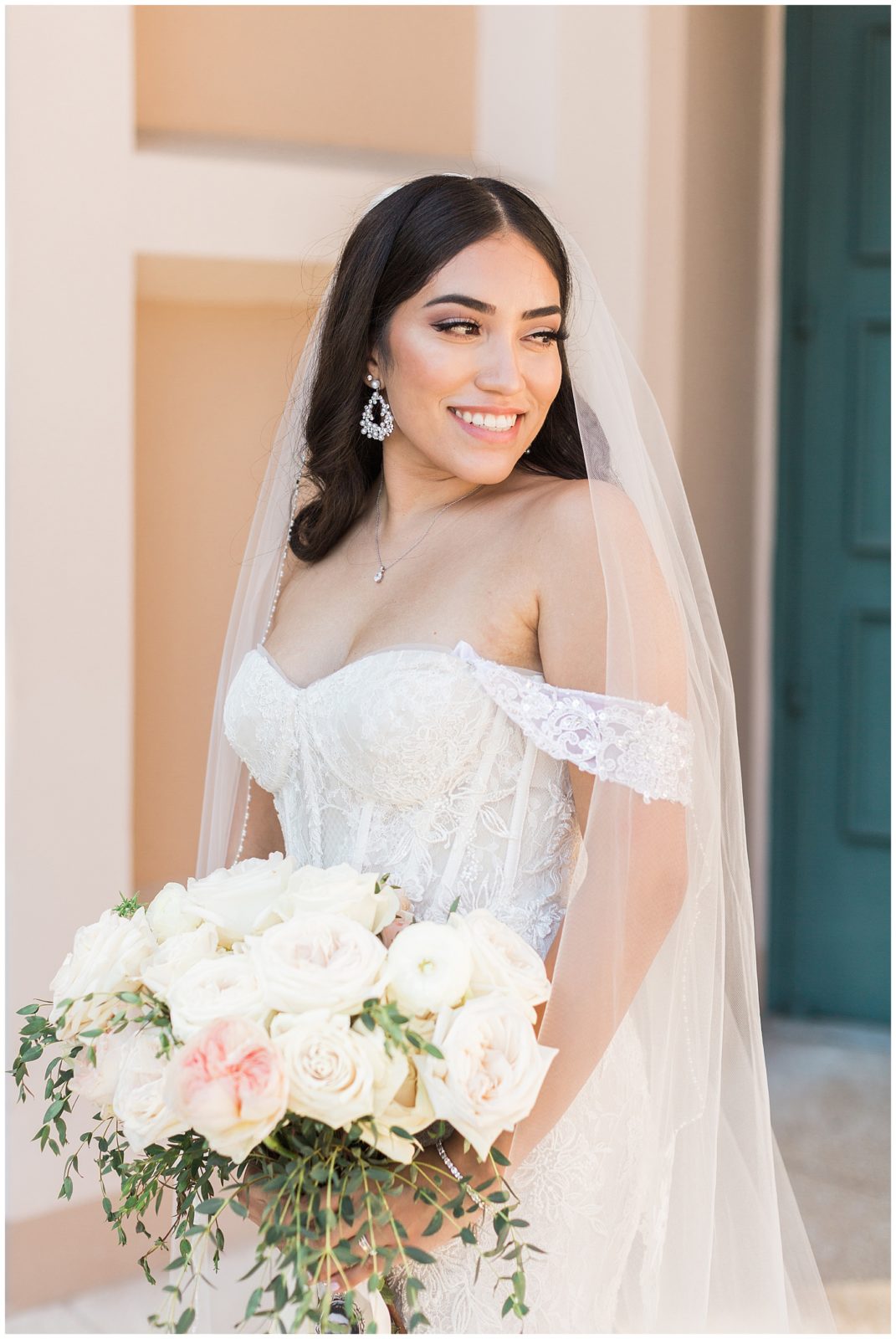 bride portraits with white flowers