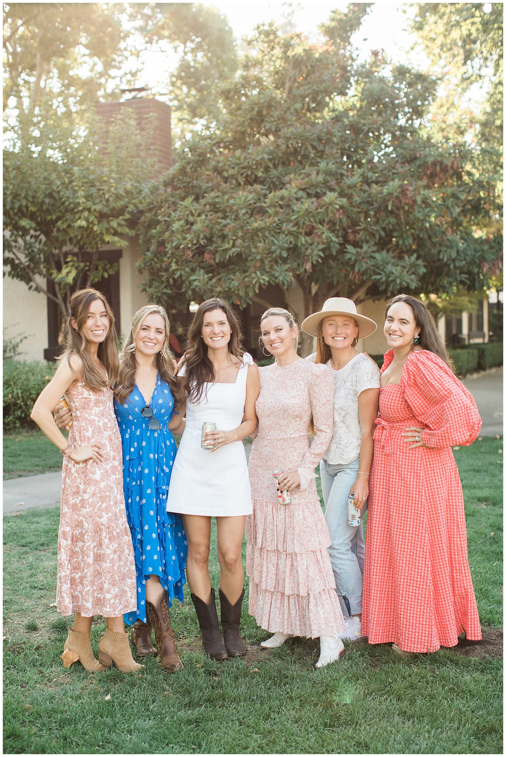 bride with her friends at rustic welcome party outfit
